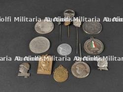Lot de médailles à l’effigie de Mussolini. Lot of medals bearing the effigy of Mussolini.